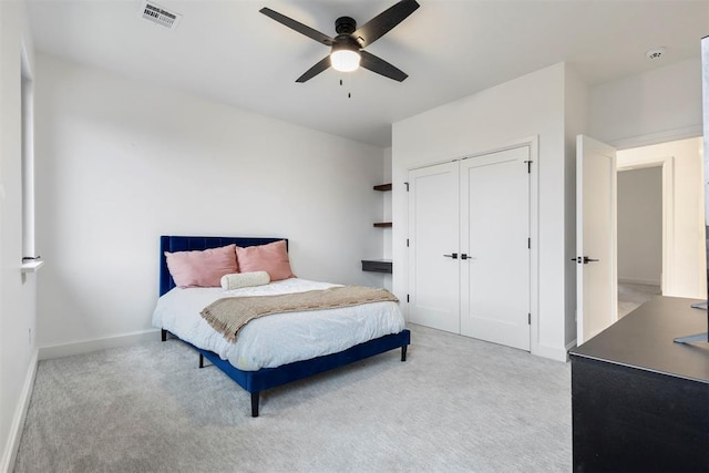 2109 Wiregrass Rd, Edmond, OK 73025 - bedroom with carpet floors, a closet, and ceiling fan