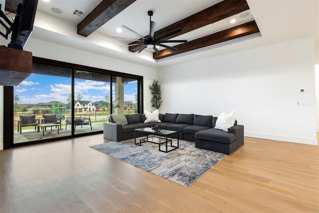 2109 Wiregrass Rd, Edmond, OK 73025 - living area featuring ceiling fan, wood finished floors, beamed ceiling, and recessed lighting
