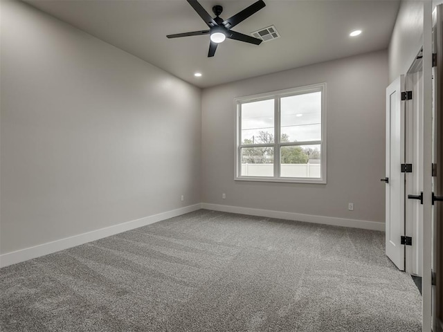 15216 Bedford Rd, Edmond, OK 73013 - unfurnished room featuring carpet flooring, visible vents, baseboards, recessed lighting, and a ceiling fan