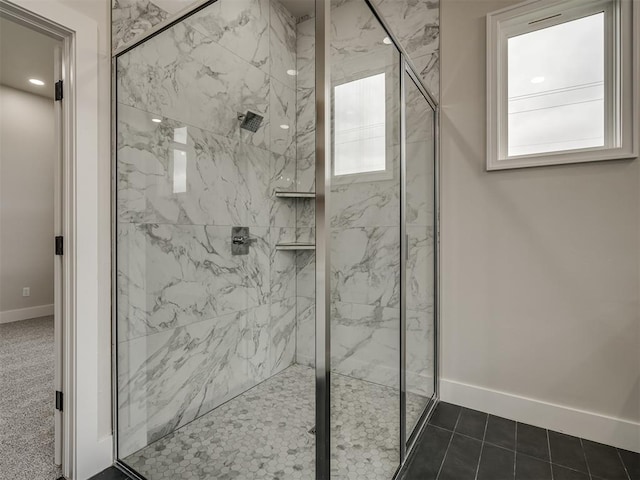 15216 Bedford Rd, Edmond, OK 73013 - bathroom with baseboards and a marble finish shower