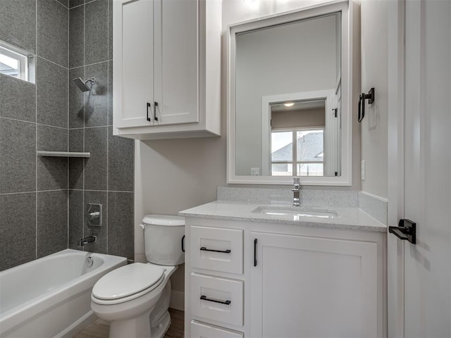 15216 Bedford Rd, Edmond, OK 73013 - full bathroom with washtub / shower combination, toilet, and vanity