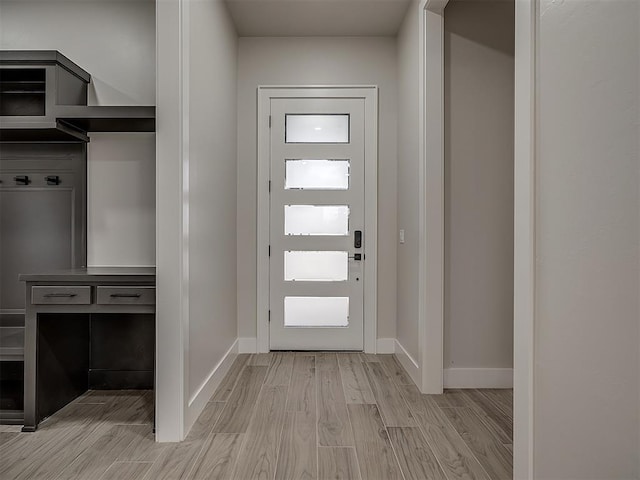 15216 Bedford Rd, Edmond, OK 73013 - entrance foyer featuring baseboards and light wood-style floors