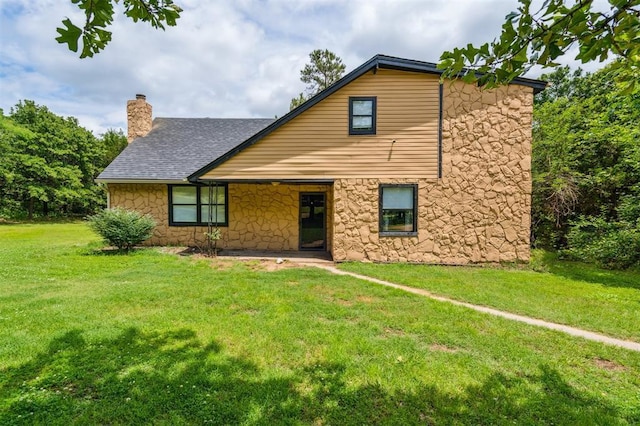 3206 Oakbriar Dr, Choctaw, OK 73020 - view of front of home featuring a chimney, a front yard, and stone siding