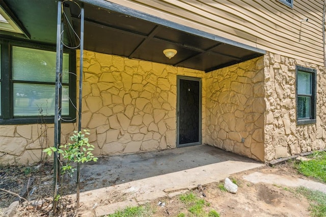 3206 Oakbriar Dr, Choctaw, OK 73020 - property entrance featuring stone siding