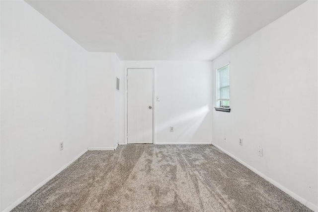 3206 Oakbriar Dr, Choctaw, OK 73020 - carpeted spare room with baseboards