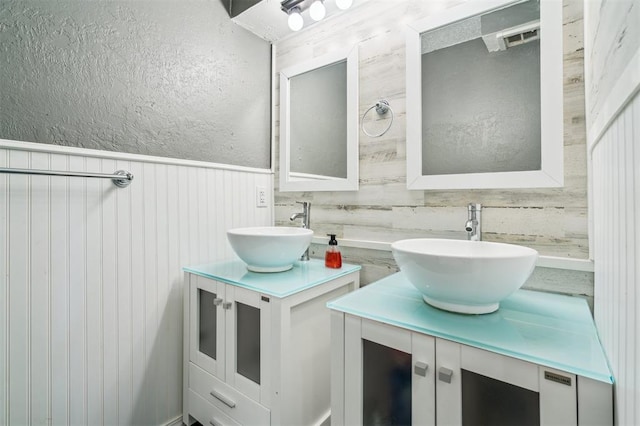 3206 Oakbriar Dr, Choctaw, OK 73020 - bathroom with vanity and a textured wall