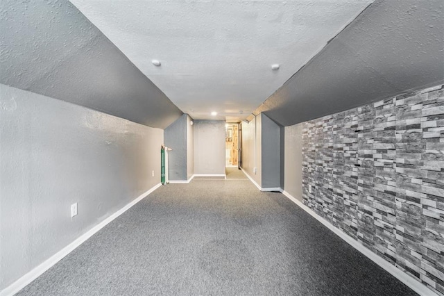 3206 Oakbriar Dr, Choctaw, OK 73020 - finished below grade area featuring a textured ceiling and baseboards