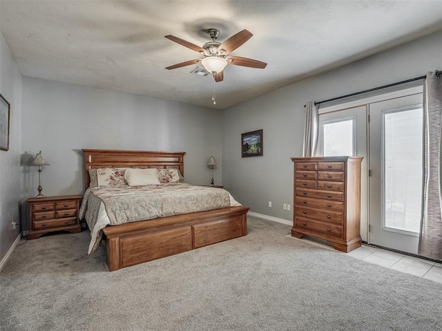 bedroom featuring a ceiling fan, carpet floors, baseboards, access to exterior, and visible vents