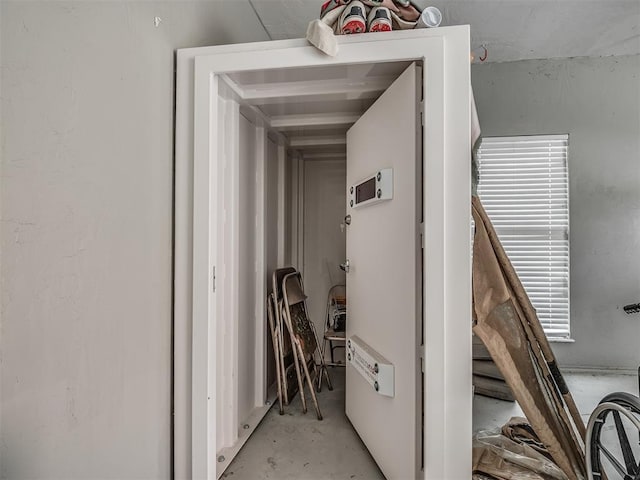 corridor with concrete floors