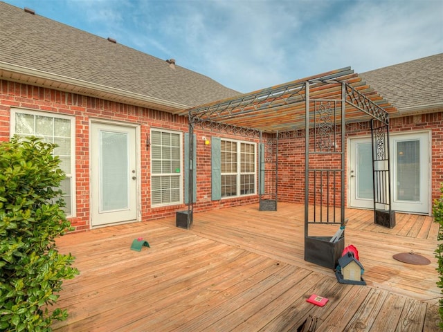 wooden terrace with a pergola