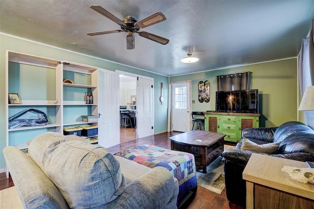 1011 W Mansur Ave, Guthrie, OK 73044 - living room with dark wood-style floors and a ceiling fan