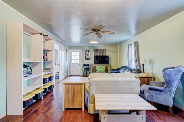 1011 W Mansur Ave, Guthrie, OK 73044 - living room featuring ceiling fan, crown molding, and dark wood-style floors