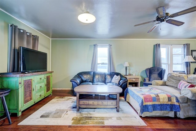 1011 W Mansur Ave, Guthrie, OK 73044 - living room with dark wood-style floors, a ceiling fan, and crown molding