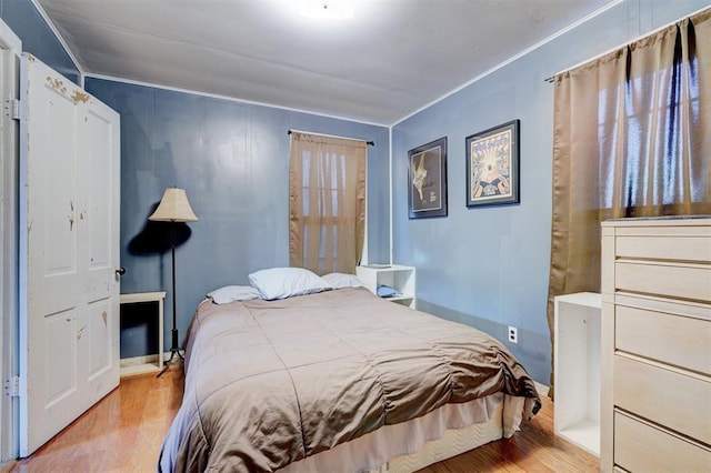 1011 W Mansur Ave, Guthrie, OK 73044 - bedroom with wood finished floors