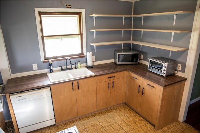 1011 W Mansur Ave, Guthrie, OK 73044 - kitchen with dishwasher, open shelves, stainless steel microwave, and wood counters