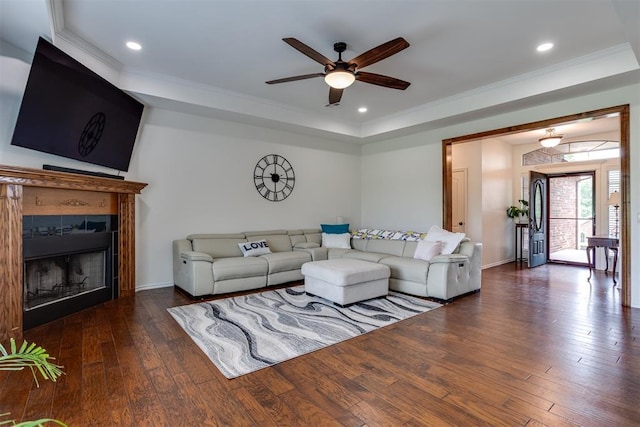 6574 Mint Julep Ln, Guthrie, OK 73044 - living room featuring hardwood / wood-style floors, a raised ceiling, a ceiling fan, ornamental molding, and recessed lighting