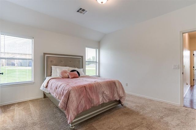 6574 Mint Julep Ln, Guthrie, OK 73044 - carpeted bedroom featuring baseboards and lofted ceiling