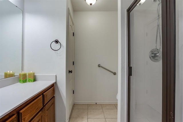 6574 Mint Julep Ln, Guthrie, OK 73044 - bathroom featuring a shower stall, vanity, and tile patterned flooring