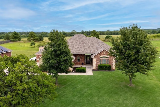 6574 Mint Julep Ln, Guthrie, OK 73044 - view of front of home with a front lawn and brick siding