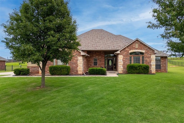 6574 Mint Julep Ln, Guthrie, OK 73044 - view of front of house featuring brick siding and a shingled roof