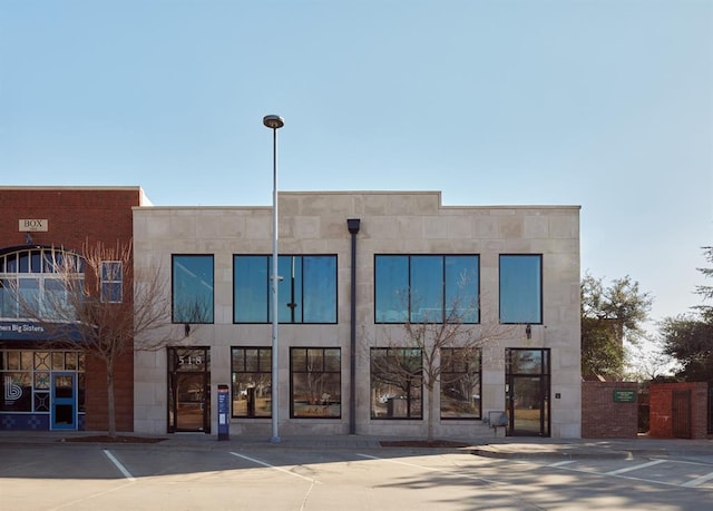 518 Colcord Dr, Oklahoma City, OK 73102 - view of building exterior with uncovered parking