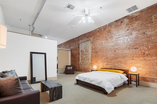 518 Colcord Dr, Oklahoma City, OK 73102 - bedroom featuring visible vents, carpet, and brick wall