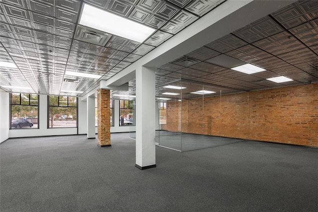 518 Colcord Dr, Oklahoma City, OK 73102 - interior space featuring decorative columns and brick wall