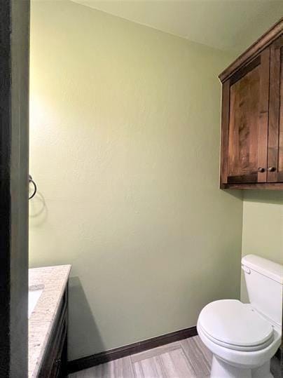 708 Kearny Ln, Yukon, OK 73099 - bathroom with vanity and wood finished floors