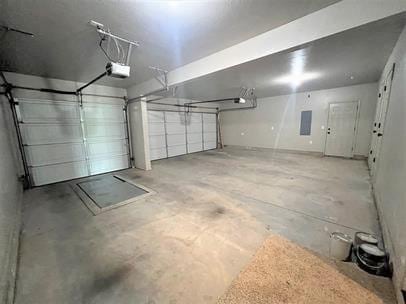 708 Kearny Ln, Yukon, OK 73099 - garage with a garage door opener and electric panel