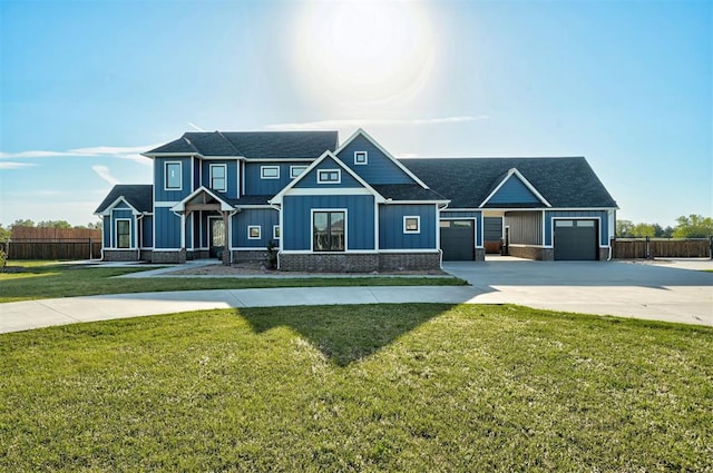 115 Weaver Ct, Noble, OK 73068 - craftsman-style house featuring a front lawn, concrete driveway, fence, an attached garage, and board and batten siding