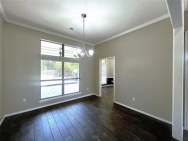 713 NW 143rd St, Edmond, OK 73013 - empty room featuring a chandelier, dark wood-type flooring, crown molding, and a textured ceiling