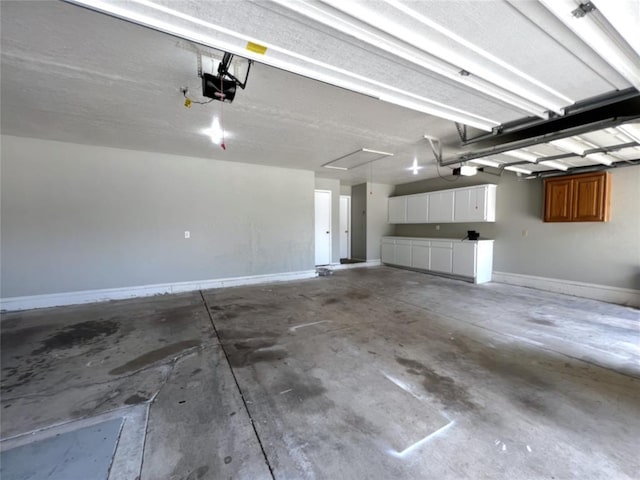 713 NW 143rd St, Edmond, OK 73013 - garage with a garage door opener