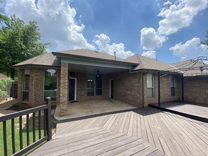 713 NW 143rd St, Edmond, OK 73013 - view of wooden deck