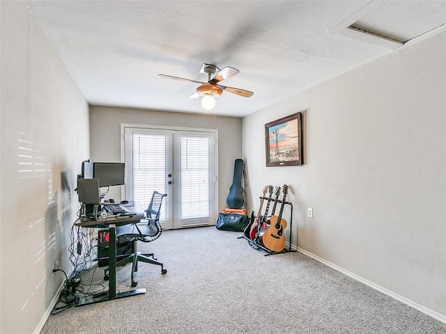 home office featuring baseboards, a ceiling fan, and carpet flooring