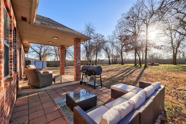 11821 Coyote Run, Guthrie, OK 73044 - view of patio / terrace with a grill, a storage unit, an outdoor structure, a fenced backyard, and an outdoor living space