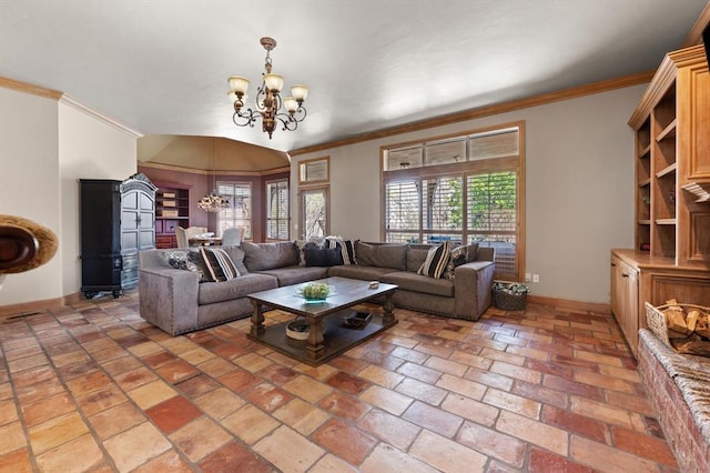 2817 Sweetbriar Way, Edmond, OK 73034 - living room with a chandelier, baseboards, and ornamental molding