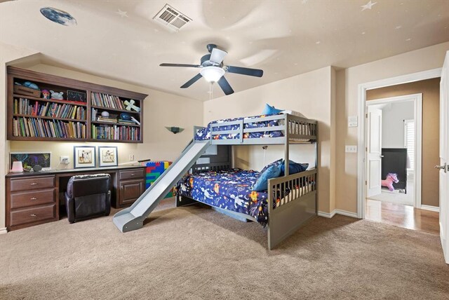 2817 Sweetbriar Way, Edmond, OK 73034 - carpeted bedroom featuring a ceiling fan and baseboards