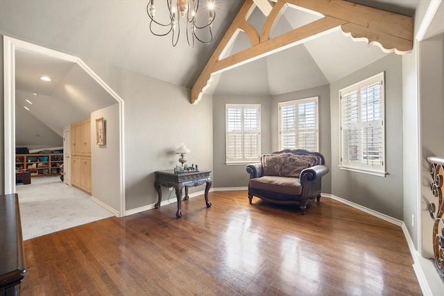 2817 Sweetbriar Way, Edmond, OK 73034 - living area with a chandelier, baseboards, and wood finished floors