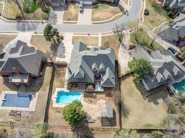 2817 Sweetbriar Way, Edmond, OK 73034 - aerial view of property and surrounding area featuring a pool area and nearby suburban area