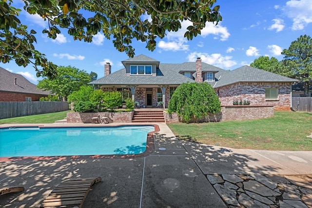 2817 Sweetbriar Way, Edmond, OK 73034 - view of swimming pool with a patio area