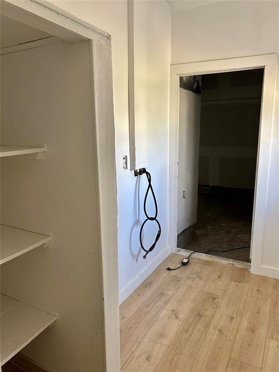 bathroom with wood finished floors