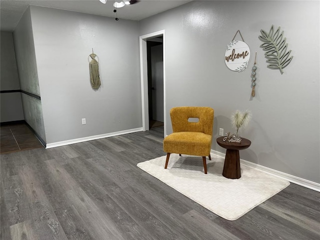 665 NW 15th St, Moore, OK 73160 - living area with dark wood-style floors and a ceiling fan