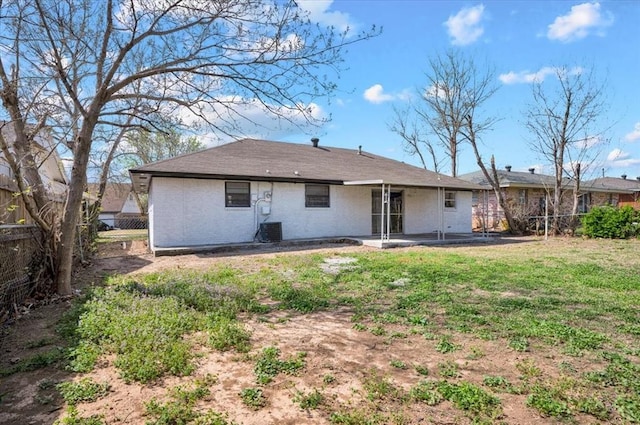 665 NW 15th St, Moore, OK 73160 - back of house with a fenced backyard, brick siding, and a patio