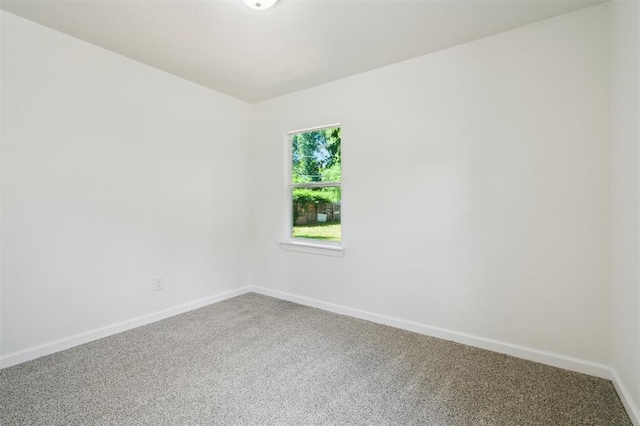 2233 SW 40th St, Oklahoma City, OK 73119 - unfurnished room featuring carpet flooring and baseboards