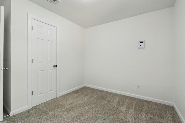 2233 SW 40th St, Oklahoma City, OK 73119 - carpeted empty room featuring baseboards