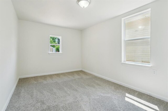 2233 SW 40th St, Oklahoma City, OK 73119 - carpeted spare room with baseboards