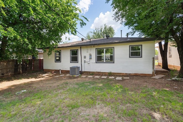 2233 SW 40th St, Oklahoma City, OK 73119 - back of property featuring cooling unit