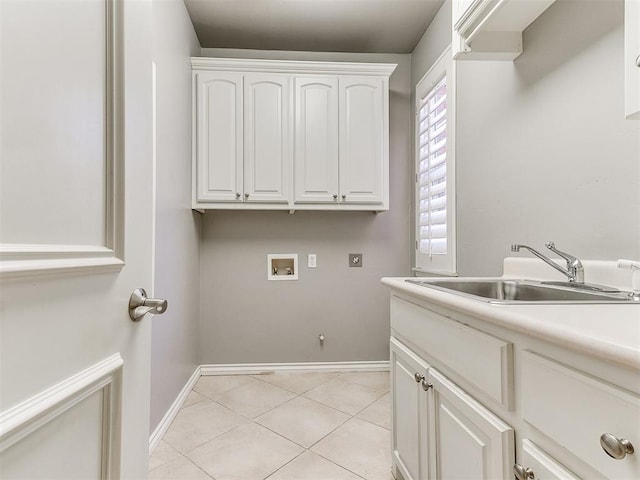 laundry area featuring light tile patterned flooring, a sink, electric dryer hookup, cabinet space, and hookup for a washing machine