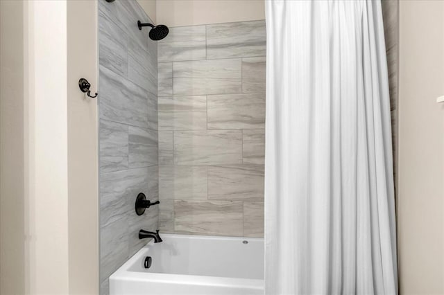bathroom with shower / bath combination with curtain