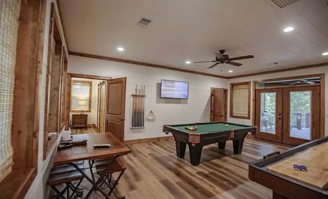 recreation room featuring light wood-style flooring, visible vents, crown molding, billiards, and french doors